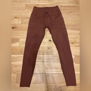 New whiteout tag, warm brown fleece lined Spyder leggings.